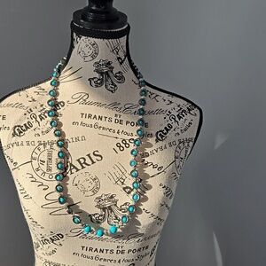 Hand-made hematite & wooden turquoise beaded necklace.  30 inches long.